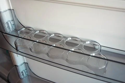 Organized Interior of New Refrigerator with Empty Shelves and Egg Tray Holder Stock-Fotos