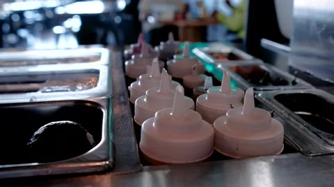 Organized Salsa and Condiment Station at Seafood Restaurant Stock Footage 340536162