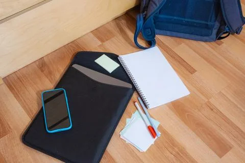 Organized study setup with notebook phone and notes Stock Photos