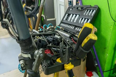 Organized toolbox containing assorted screws bolts and hand tools ready for.. Stock-Fotos