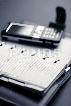 Organizer and mobile phone Stock Photos