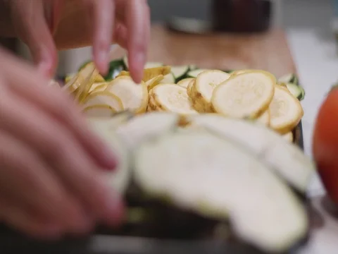 Organizing cut vegetables on a table Video stock 80543501