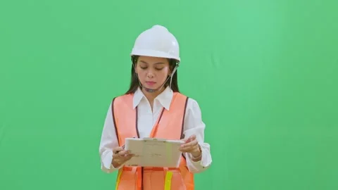 Organizing Documents Clipping New Paper to Clipboard Green Screen Vídeos de archivo 331629902