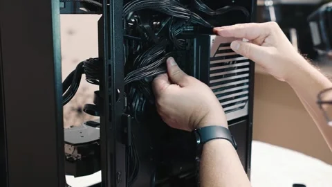 Organizing internal power cables inside computer case Stock Footage 340882139