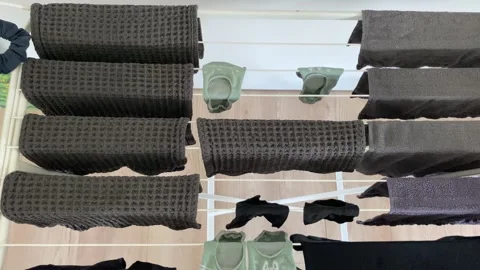 Organizing Towels for Efficient Storage Space Stock-Footage 343864679