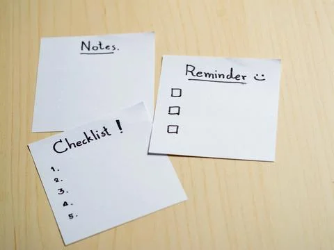 Organizing your life checklist notes and reminders on a wooden table home o.. Stock Photos