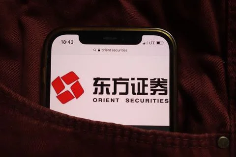Orient Securities Co Ltd logo on mobile phone Stock Photos