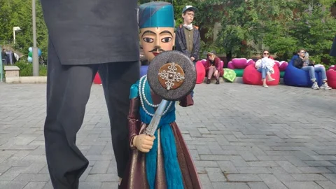 Oriental doll with shield and dagger Stock Footage 155684922