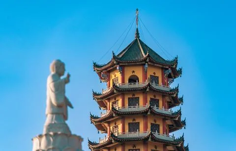 Oriental Pagoda with Clock Tower Stock Photos