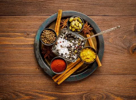 Oriental spice set - coriander, red pepper, turmeric, cinnamon, star anise Stock Photos
