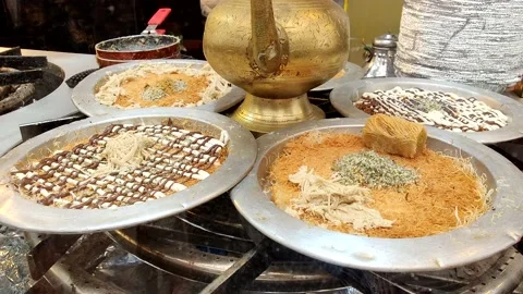 Oriental sweets spinnig on the tray Stock Footage 156801677