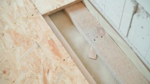 Oriented strand board on the floor during the construction of a house Stock Footage 237602556