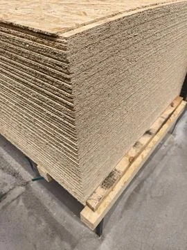 Oriented Strand Board or OSB, plate for construction project with wood stra.. Stock Photos