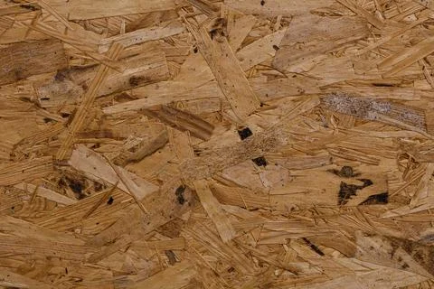 Oriented strand board OSB wallpaper. Abstract wooden background. Stock Photos