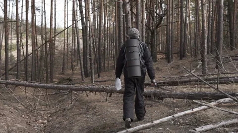 Orienteering in the forest. Traveling alone with a map. Stock Footage 196400913