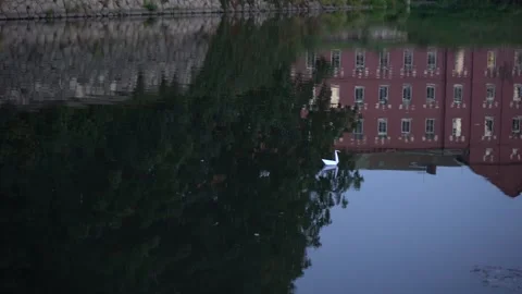 Origami floating on river Stock Footage 228845091