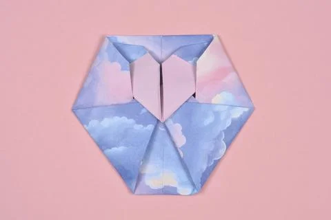 Origami Heart Envelope with Cloud Pattern on Pink Background Stock Photos
