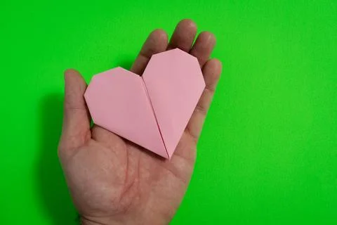 Origami hearts made with colored paper for congratulations on Valentine's Day Stock Photos
