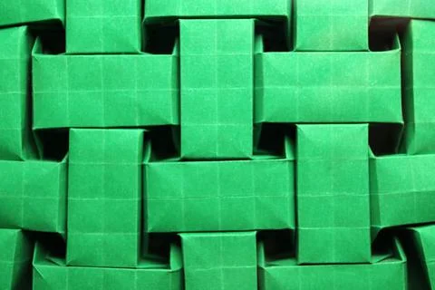 Origami rectangular tessellation - green paper macro - close up - screen back Stock Photos