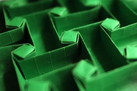 Origami rectangular tessellation - green paper macro - close up - screen back 스톡 사진