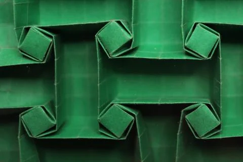 Origami rectangular tessellation - green paper macro - close up - screen back Stock Photos