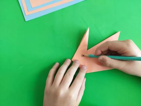 Origami step by step. How to make a paper bunny for Easter greetings Stock Photos