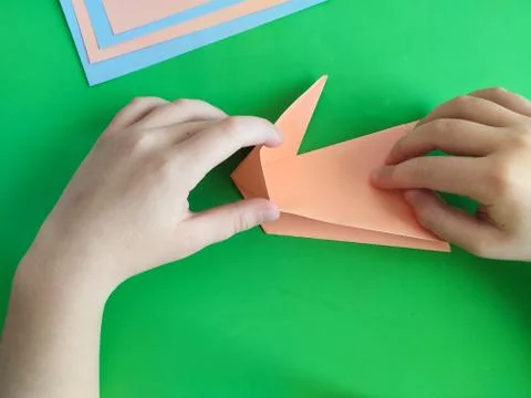 Origami step by step. How to make a paper bunny for Easter greetings Stock Photos