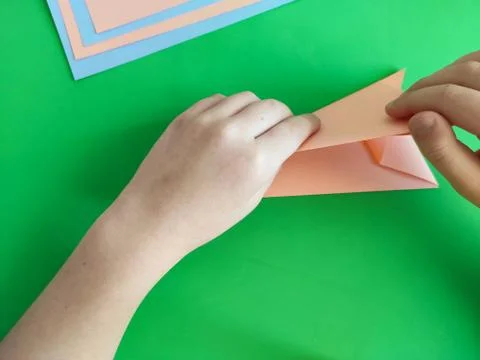 Origami step by step. How to make a paper bunny for Easter greetings Stock Photos