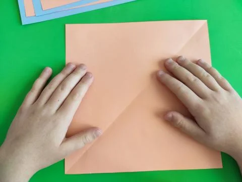 Origami step by step. How to make a paper bunny for Easter greetings Stock Photos