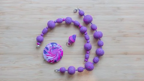 Original beads from polymeric hand-worked clay Stock Photos