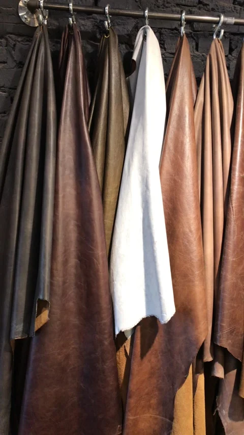 Original cow skins on hooks Stock Footage 169143583
