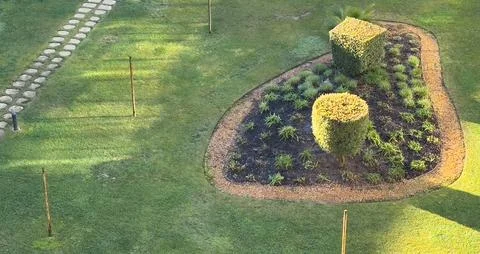 Original garden path with circular paving close-up. Pathway from brick pavi.. Stock Photos