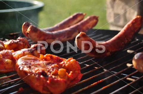 Original German Sausages on Grill Stock Photos