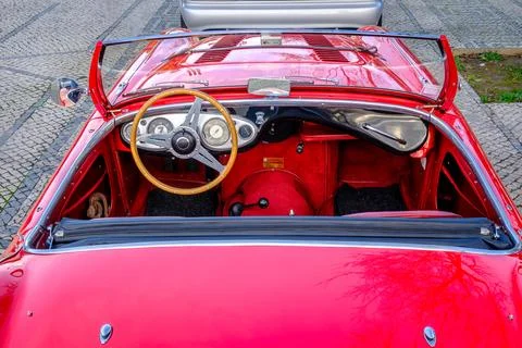 Original interior of red Austin-Healey 100 vintage convertible car Stock Photos