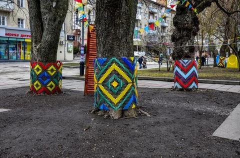 The original method of festive decoration of trees in the style of folk embro Stock Photos