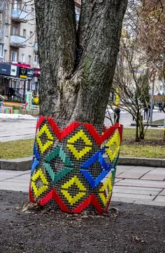 The original method of festive decoration of trees in the style of folk embro Stock Photos