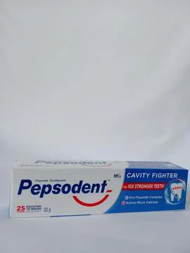 Original Pepsodent toothpaste on white background Stock Photos