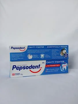 Original Pepsodent toothpaste on white background Stockfoto's