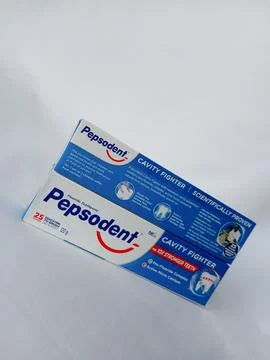Original Pepsodent toothpaste on white background Stockfoto's
