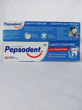Original Pepsodent toothpaste on white background Stockfoto's