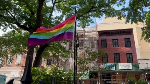 Original Pride flag flying at Stonewall National Monument in NYC Stock Footage 316966145