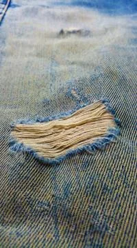 Original ripped denim background Stock Photos