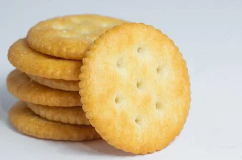 Original Ritz crackers on a white background. Close-up. Stock Photos