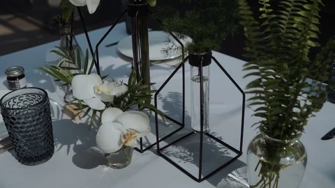 Original table setting with orchids Stock Footage 104605973