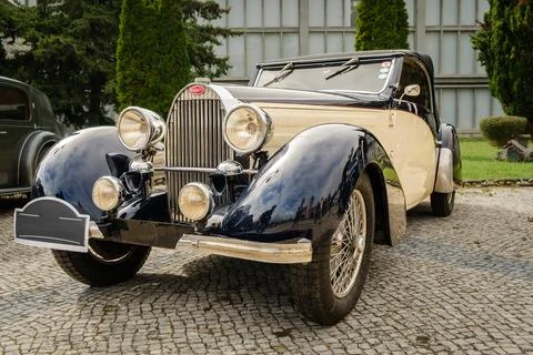 Original two-tone Bugatti Type 57 in close view on cobblestone drive Stock Photos