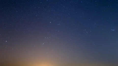 Orion constellation move over the night starry sky, time lapse scene Stock Footage 121928535