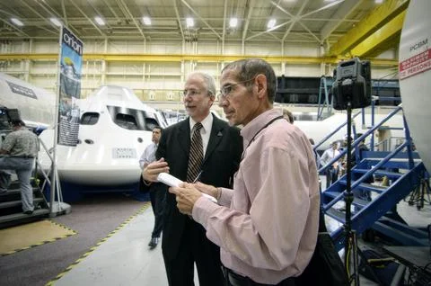 Orion Program Manager Mark Geyer tours the Orion mockups in Bldg. 스톡 사진