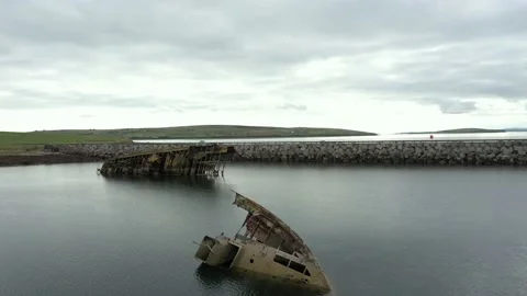 Orkney sunken block ship, drone move around, Churchill barrier background. 库存影片 160412813