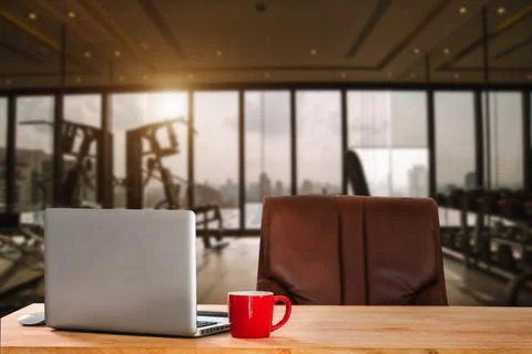 Orkspace computer putting on wood working desk  fitness Gym Stock Photos
