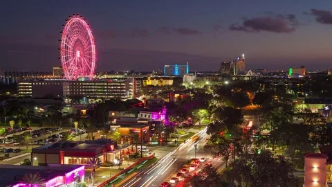 Orlando FL International Drive Timelapse with Colorful Big Wheel Attraction Stock Footage
